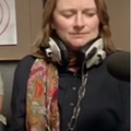 woman wearing big studio headphones around her neck 8